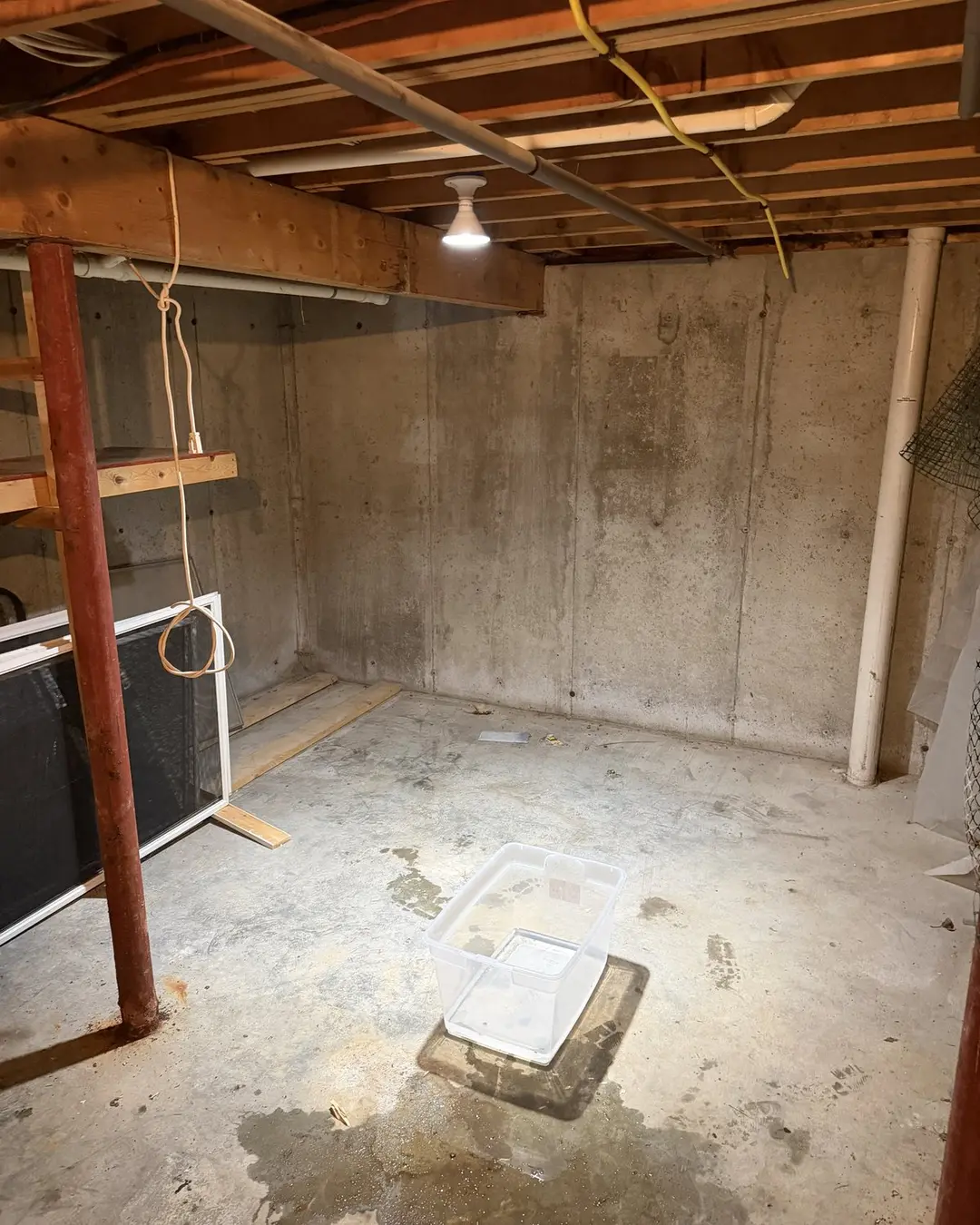 Cleared basement floor after a cleanout
