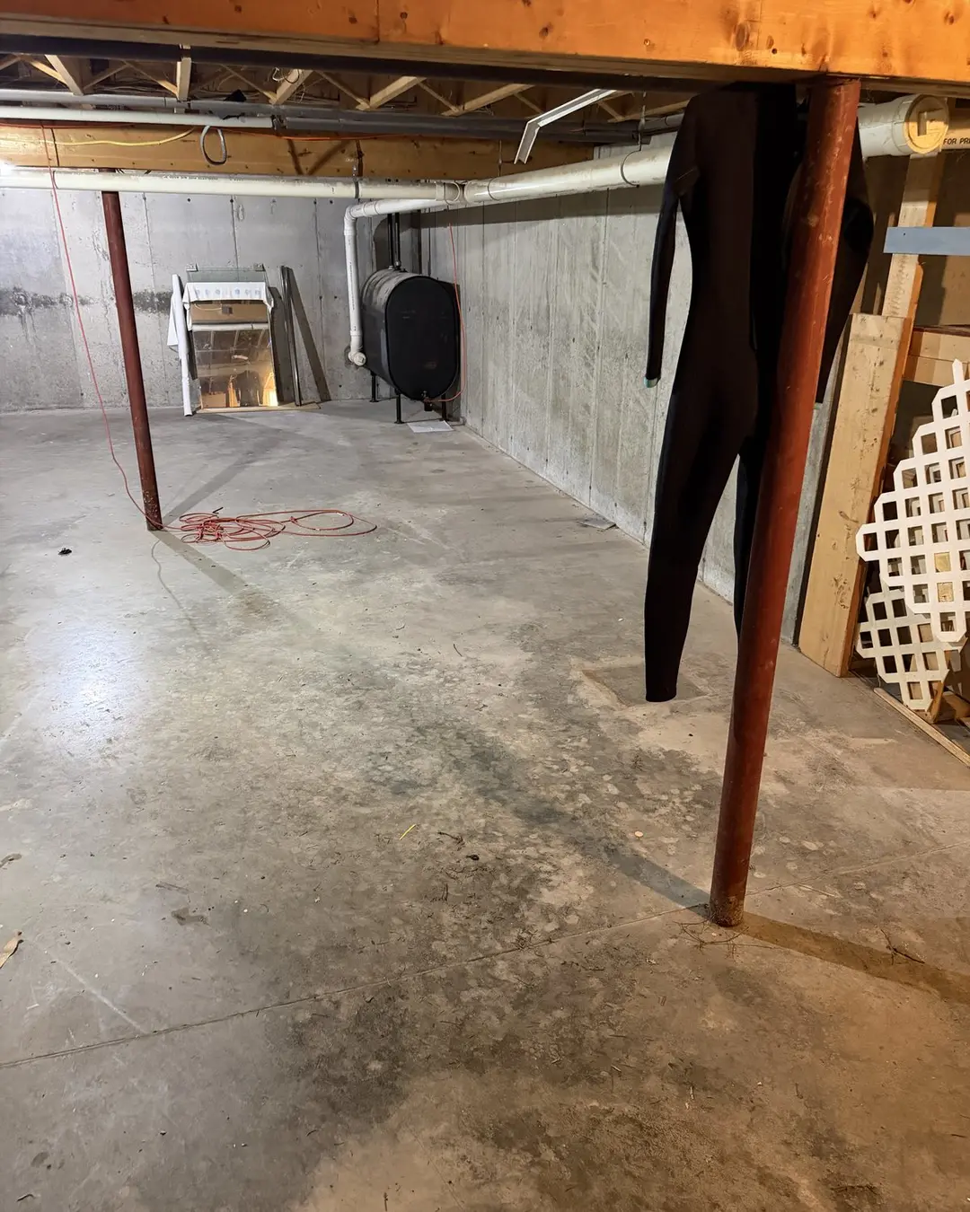 Cleared basement floor after a household cleanout
