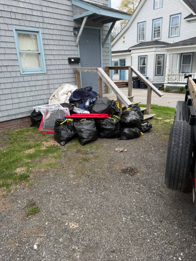 Porch cleanup before junk removal, with unwanted items